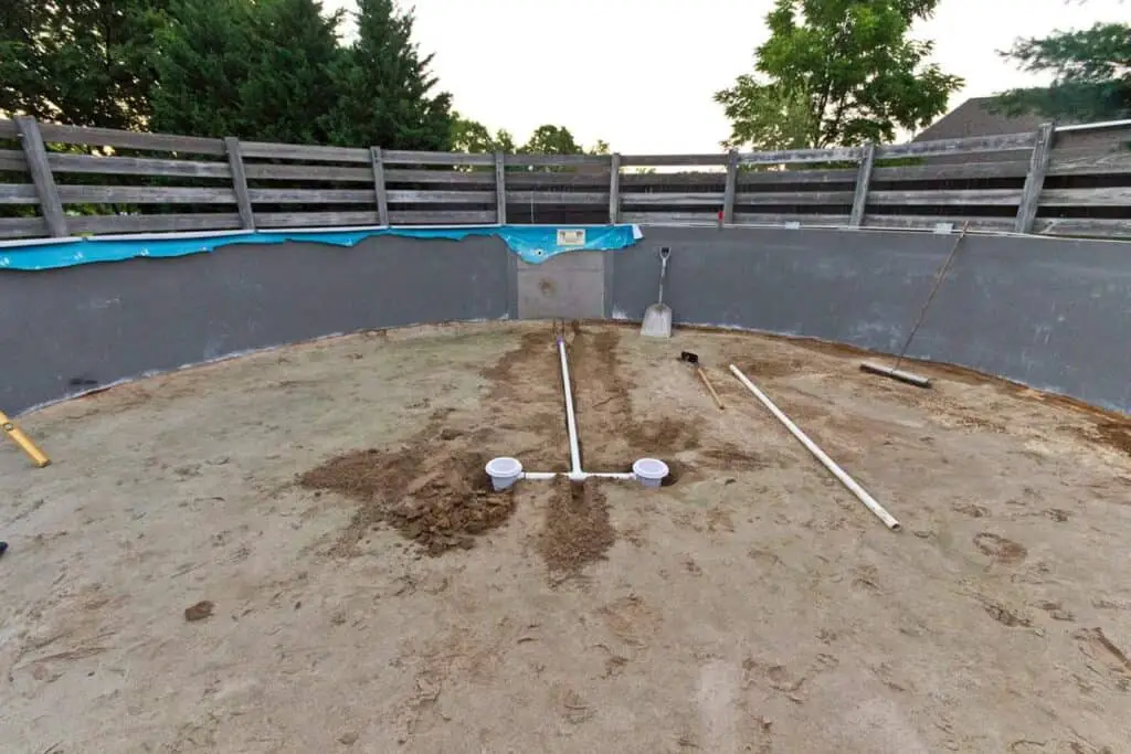 Main drain line in an above ground swimming pool before it is buried
