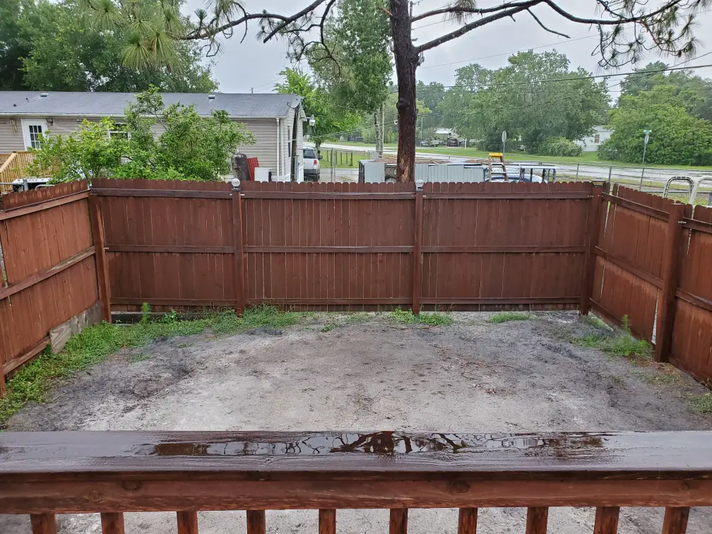 Fence put up just around an above ground swimming pool site