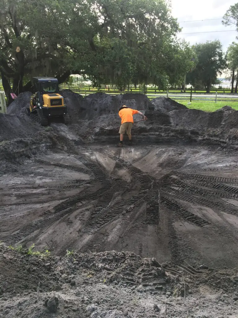 Using a skid/steer machine to level the ground for an above ground pool installation