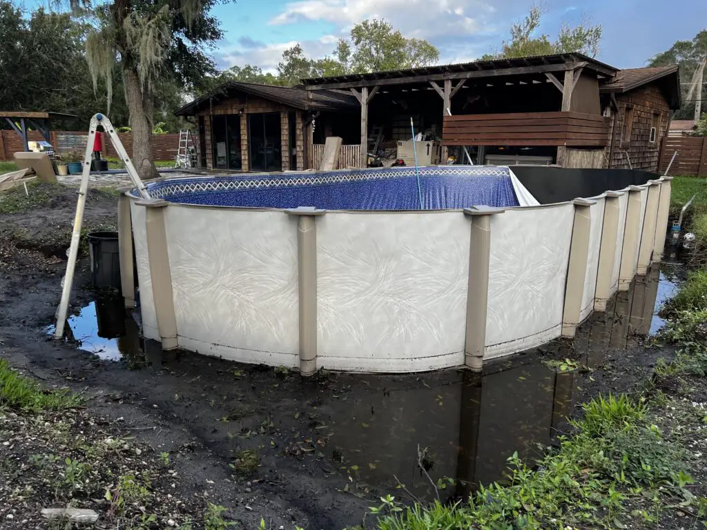 Oval above ground pool installed during the rainy season. Pool had to be taken down to wait for the ground to dry