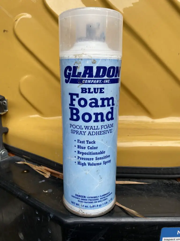 Gladdon spray glue used to attach wall foam to an above ground pool wall