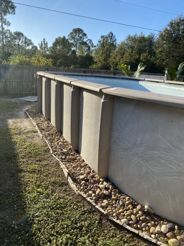 The side of a 15x30 oval above ground swimming pool