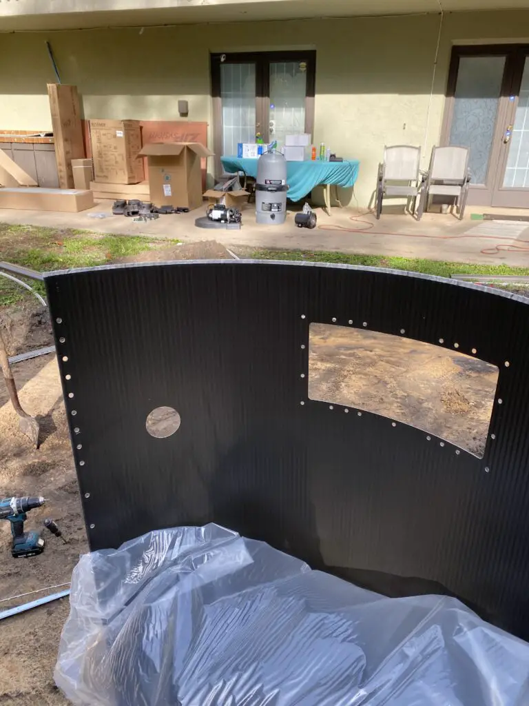 Service panel for an above ground pool that is not made of stainless steel.  