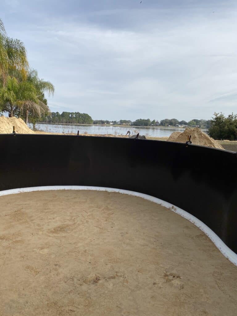 Foam coving in new oval above ground pool shown before the liner is installed