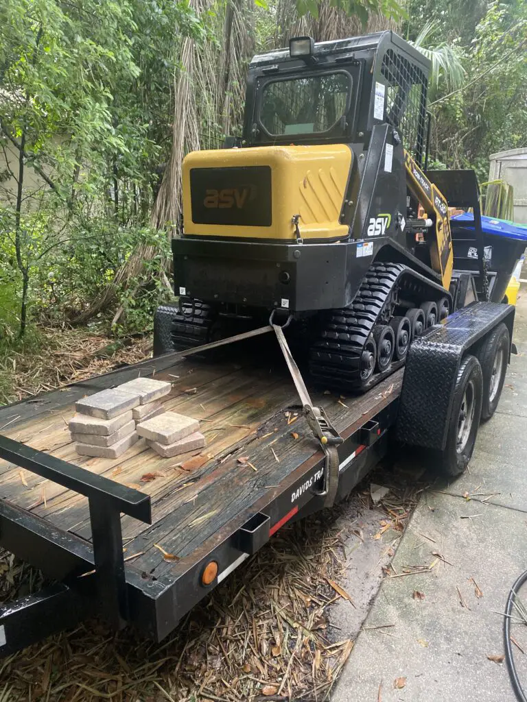 ASV RT-30 skid/steer machine used for leveling the ground installing above ground swimming pools