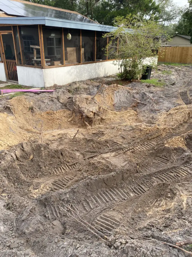 Tree stump buried where an above ground swimming pool was to be installed