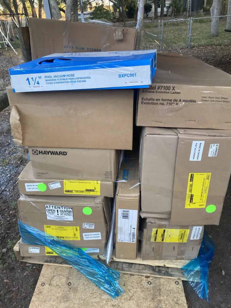 Complete 15x30 above ground pool package in boxes and still on a pallet