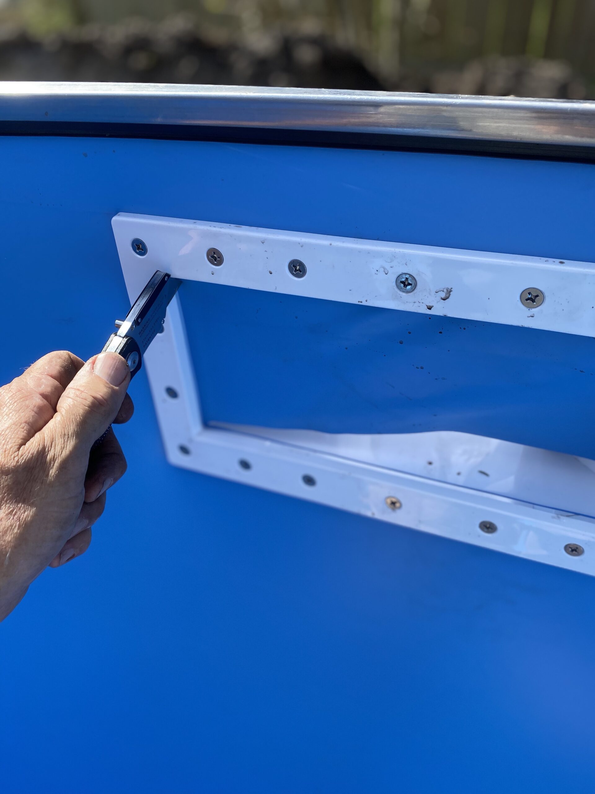 A It’s best to be in the pool when attaching the skimmer